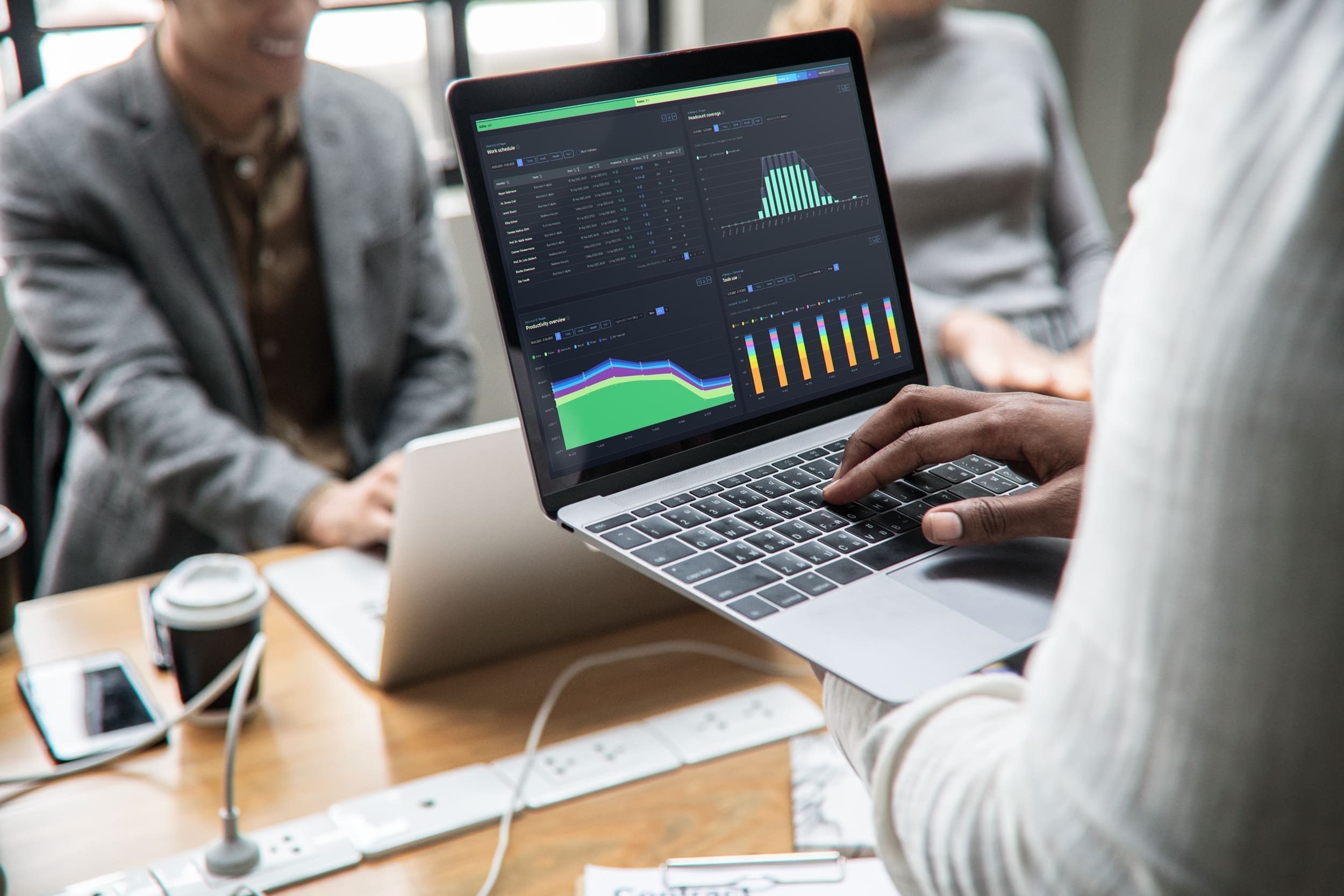 Male using a computer, demonstrating process excellence.
